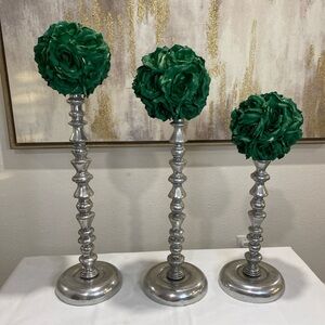 Elegant Silver Candle Holders with Green Floral Accents